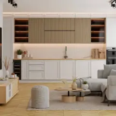 Nowoczesny salon z aneksem kuchennym. Jasne meble, wygodna kanapa i drewniane akcenty tworzą przytulną atmosferę.